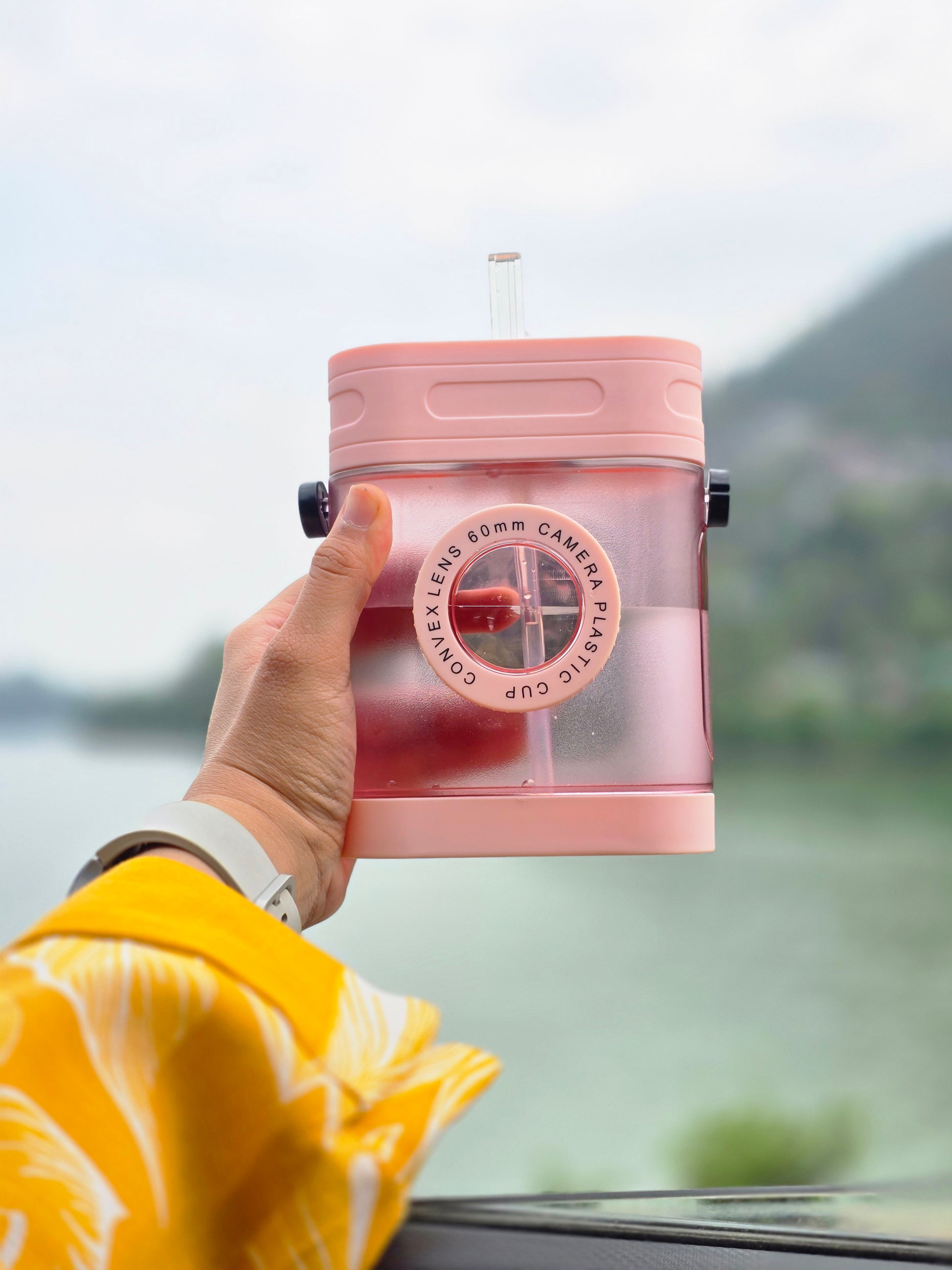 Quirky camera sipper